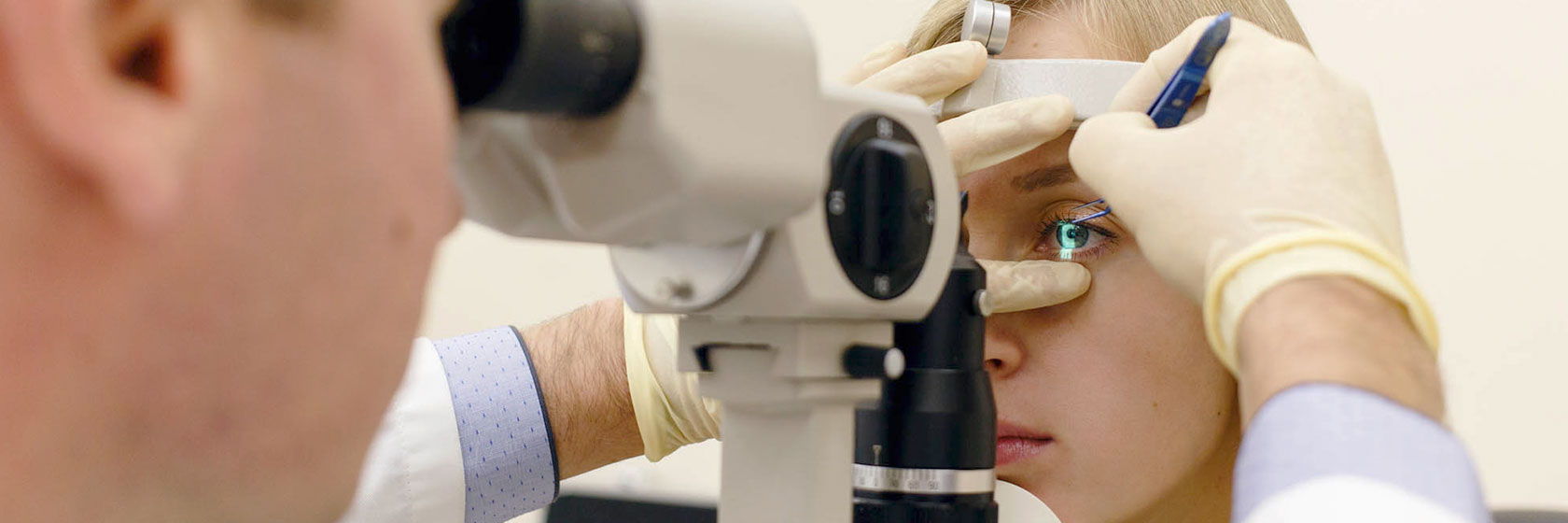 Ophthalmologist examining a patient